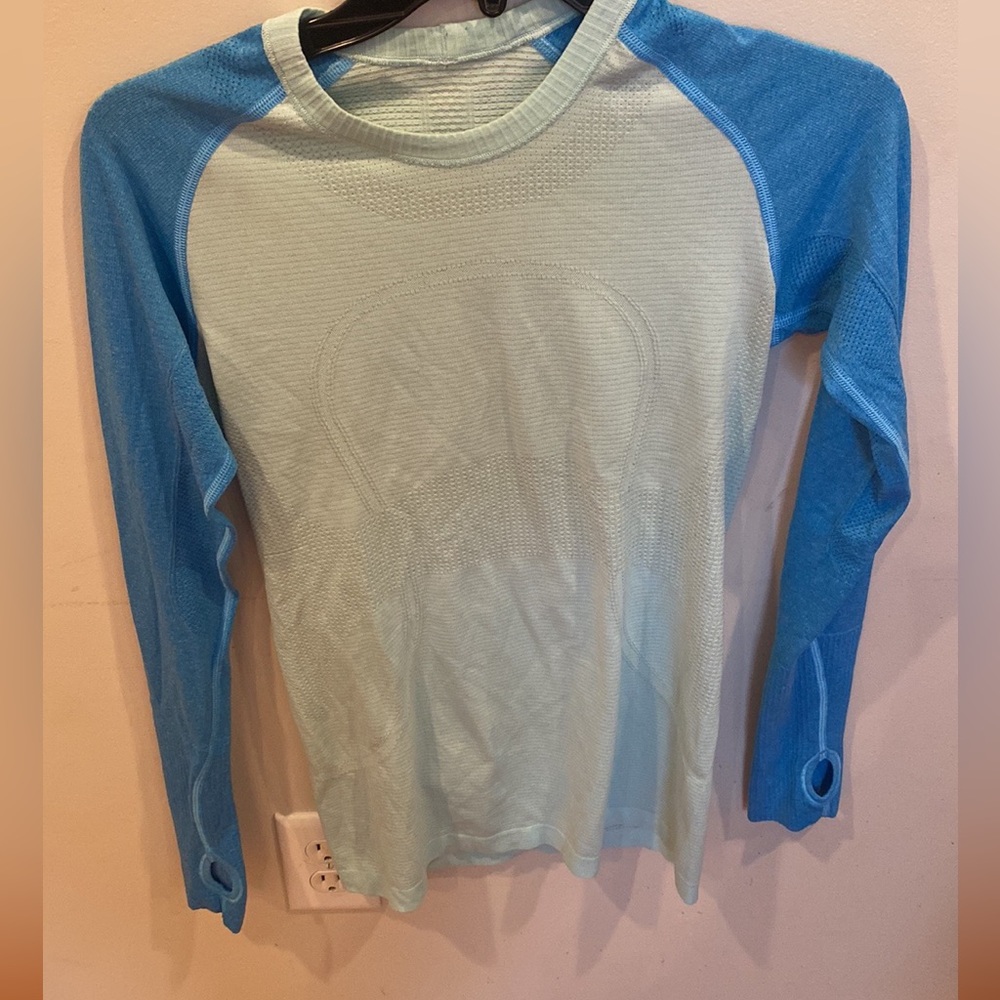 Long sleeve swiftly tech shirt. Size 6. No flaws.